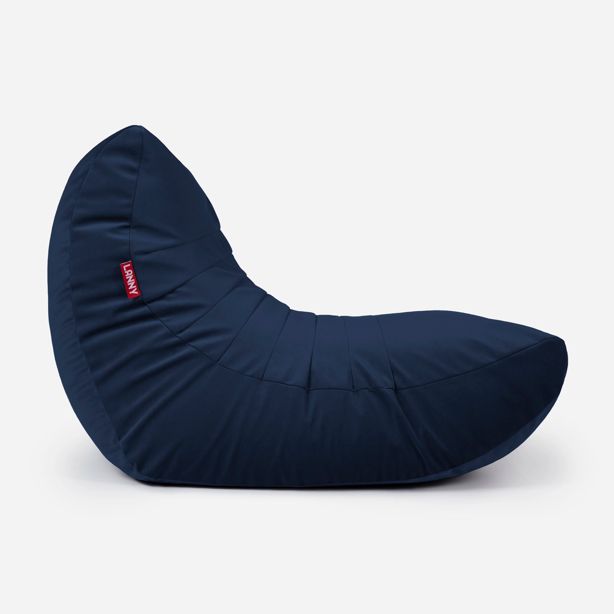 Lanny Navy blue crescent-shaped bean bag chair with a red logo on a light gray background