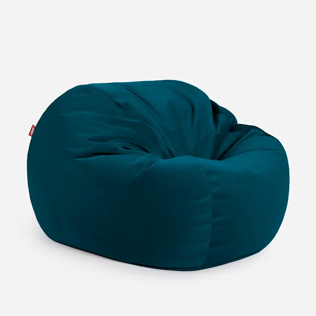 Side angle view of the Lanny Sphere Aqua velvet bean bag, demonstrating its deep 140cm footprint and structured support for UAE seating