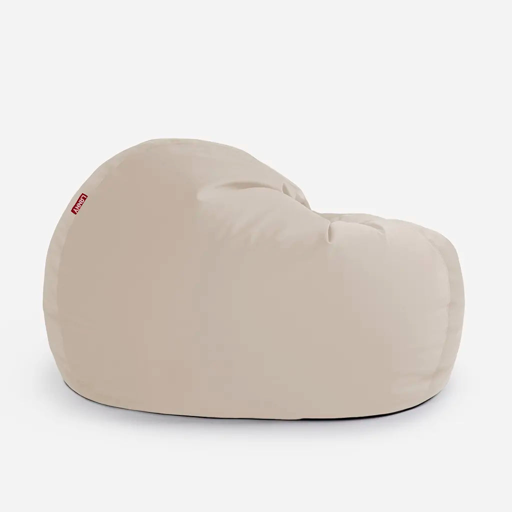 Lanny Sphere beige oversized seating for adults, showcasing the curved base and premium velvet fabric quality