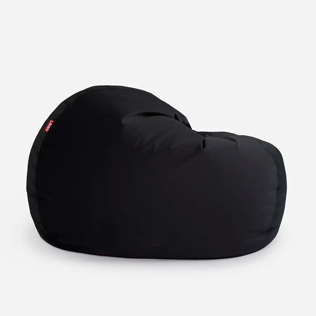 Lanny Sphere black oversized seating for adults, showcasing the curved base and premium velvet fabric quality
