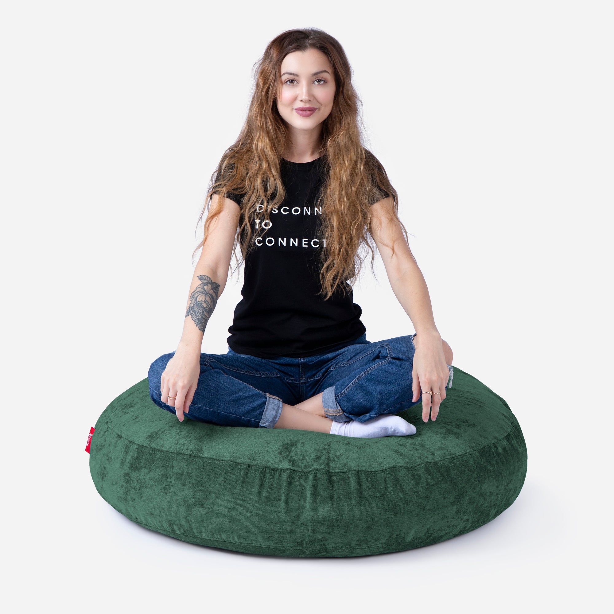 Pouf, Ottoman Green color by Lanny with girl seating on it