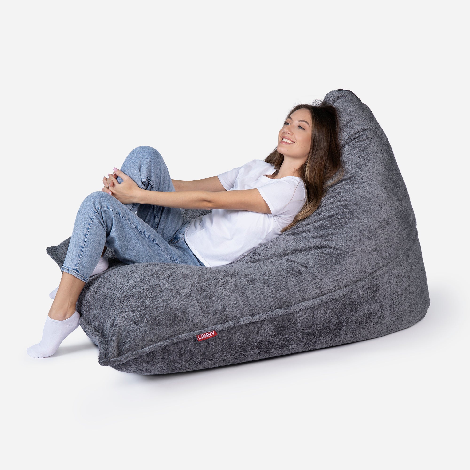 Beanbag Sloppy design fluffy fabric Dark Gray color  with girl seating on it 