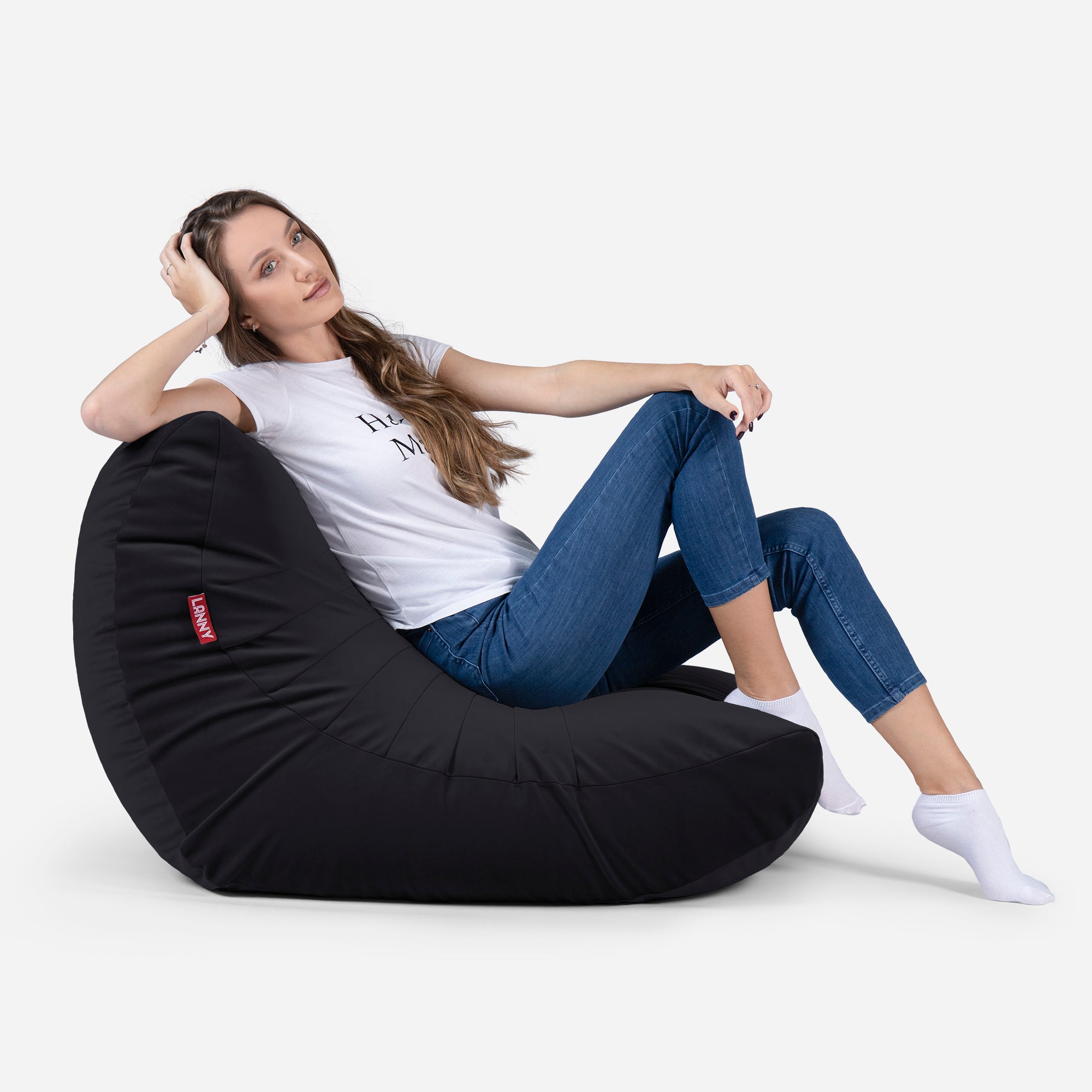 Beanbag Curvy Design Black color with girl seating on it 