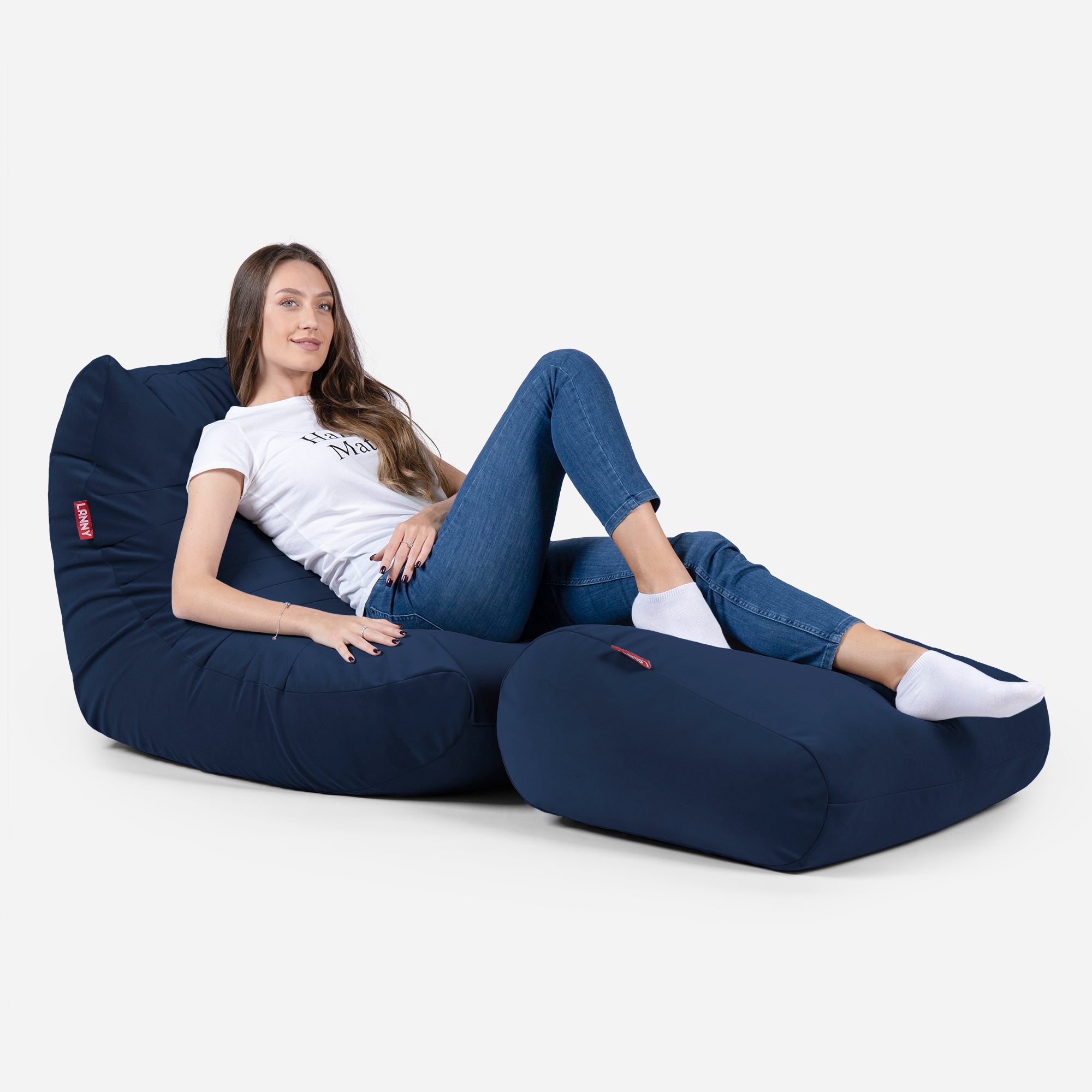 Beanbag Curvy Design Blue color with girl seating on it 