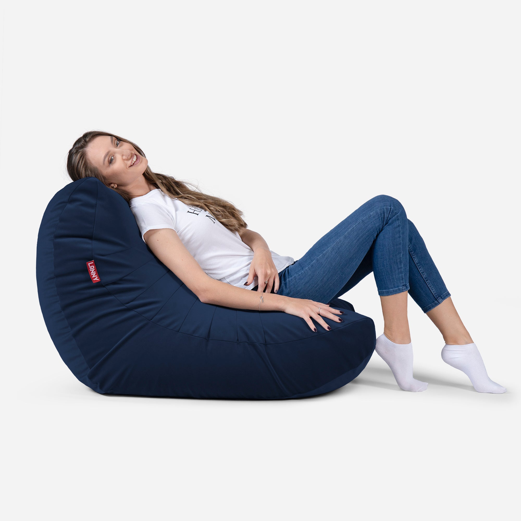 Beanbag Curvy Design Blue color with girl seating on it 