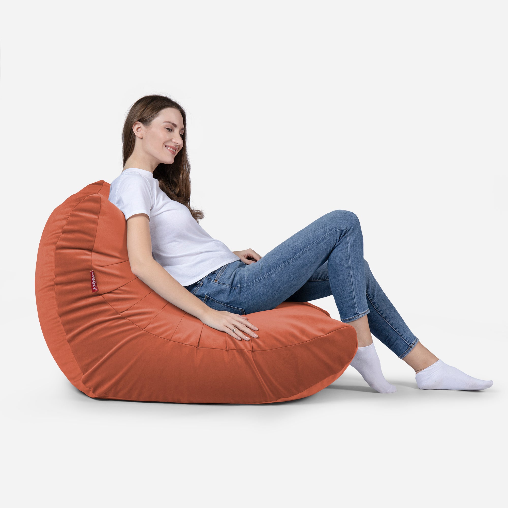 Beanbag Curvy Design Coral color with girl seating on it