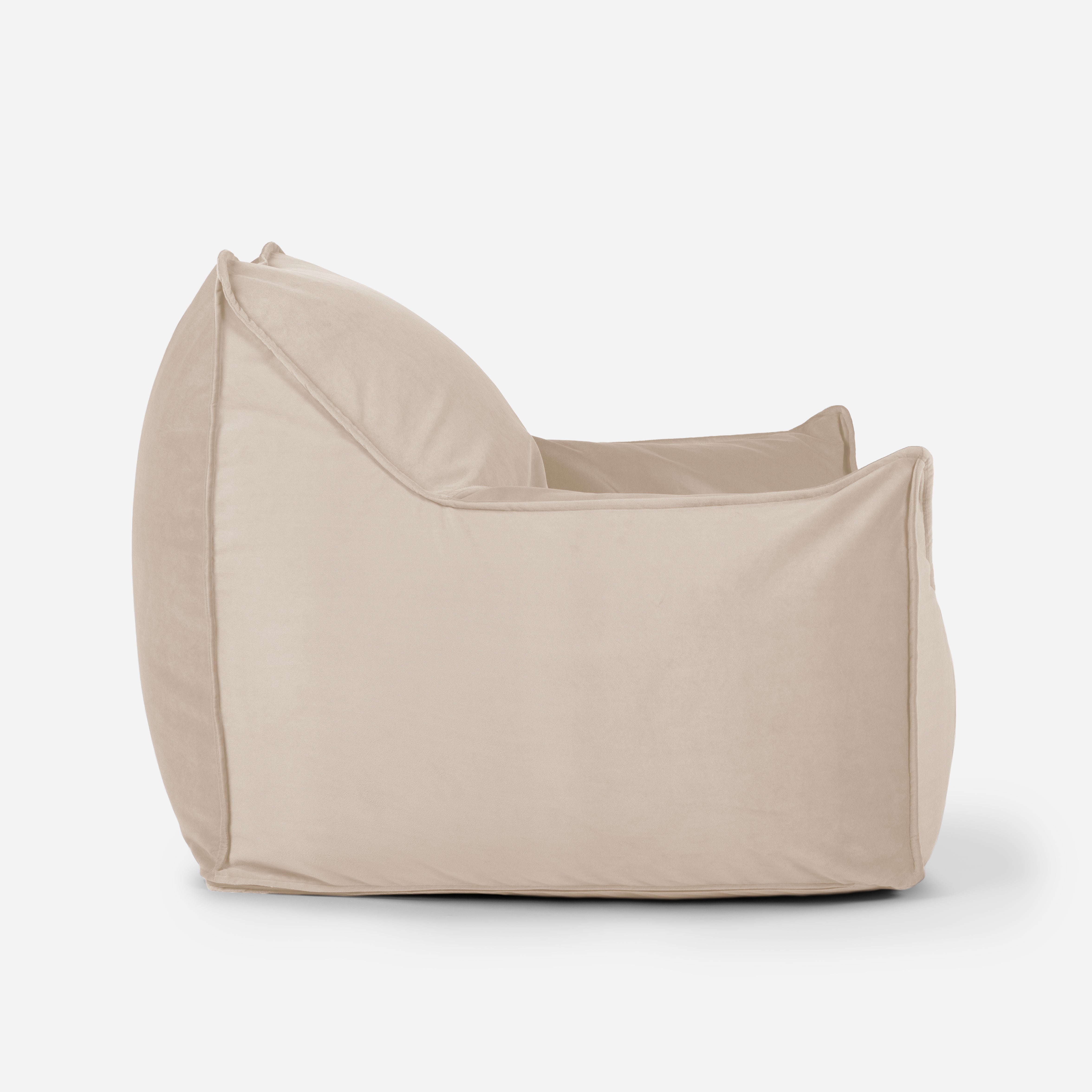 Beige velvet Lanny Uno structured bean bag showing ergonomic side profile and support.