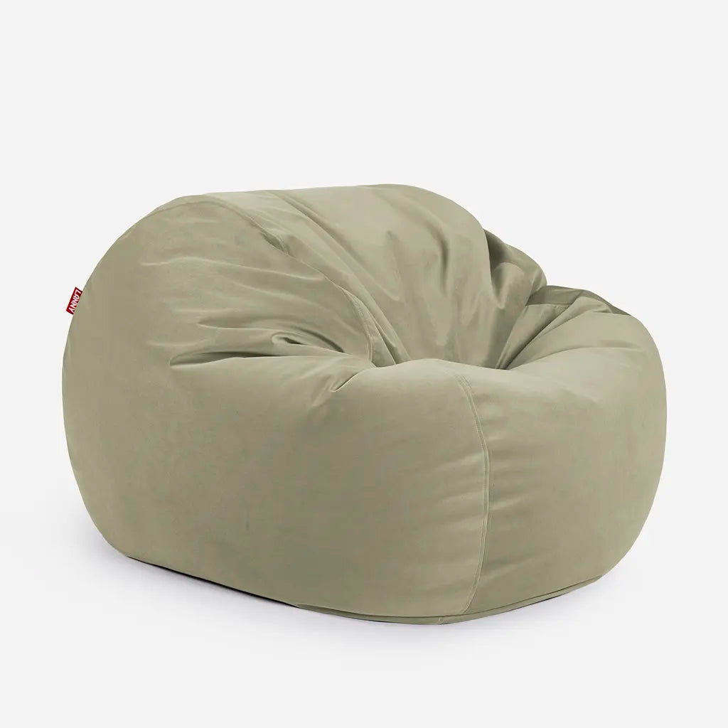 Side angle view of the Lanny Sphere khaki velvet bean bag, demonstrating its deep 140cm footprint and structured support for UAE seating