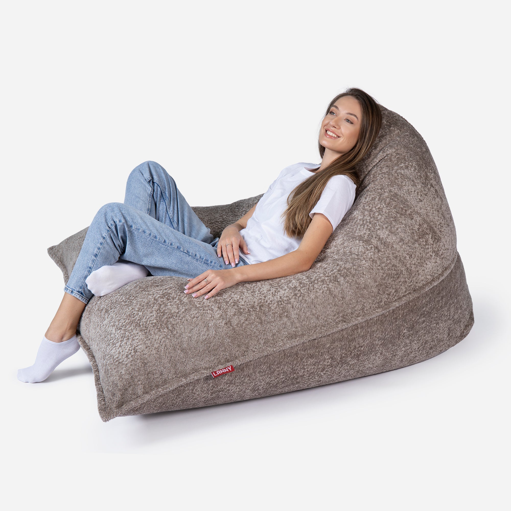 Beanbag Sloppy design fluffy fabric brown color  with girl seating on it 