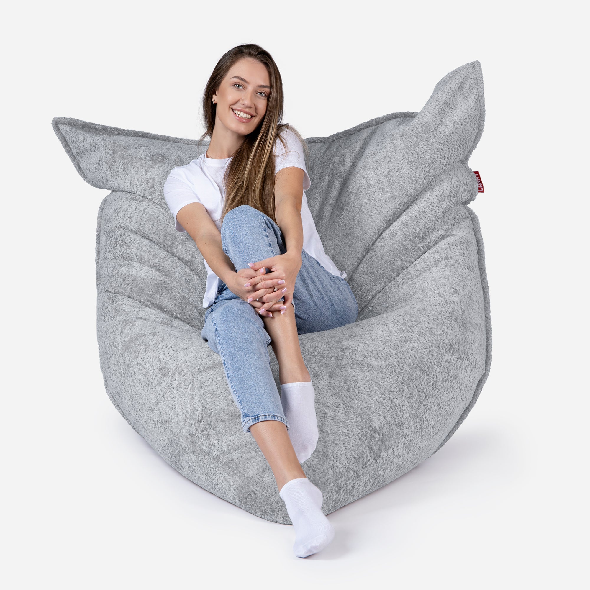 Beanbag Sloppy design fluffy fabric Gray color  with girl seating on it 