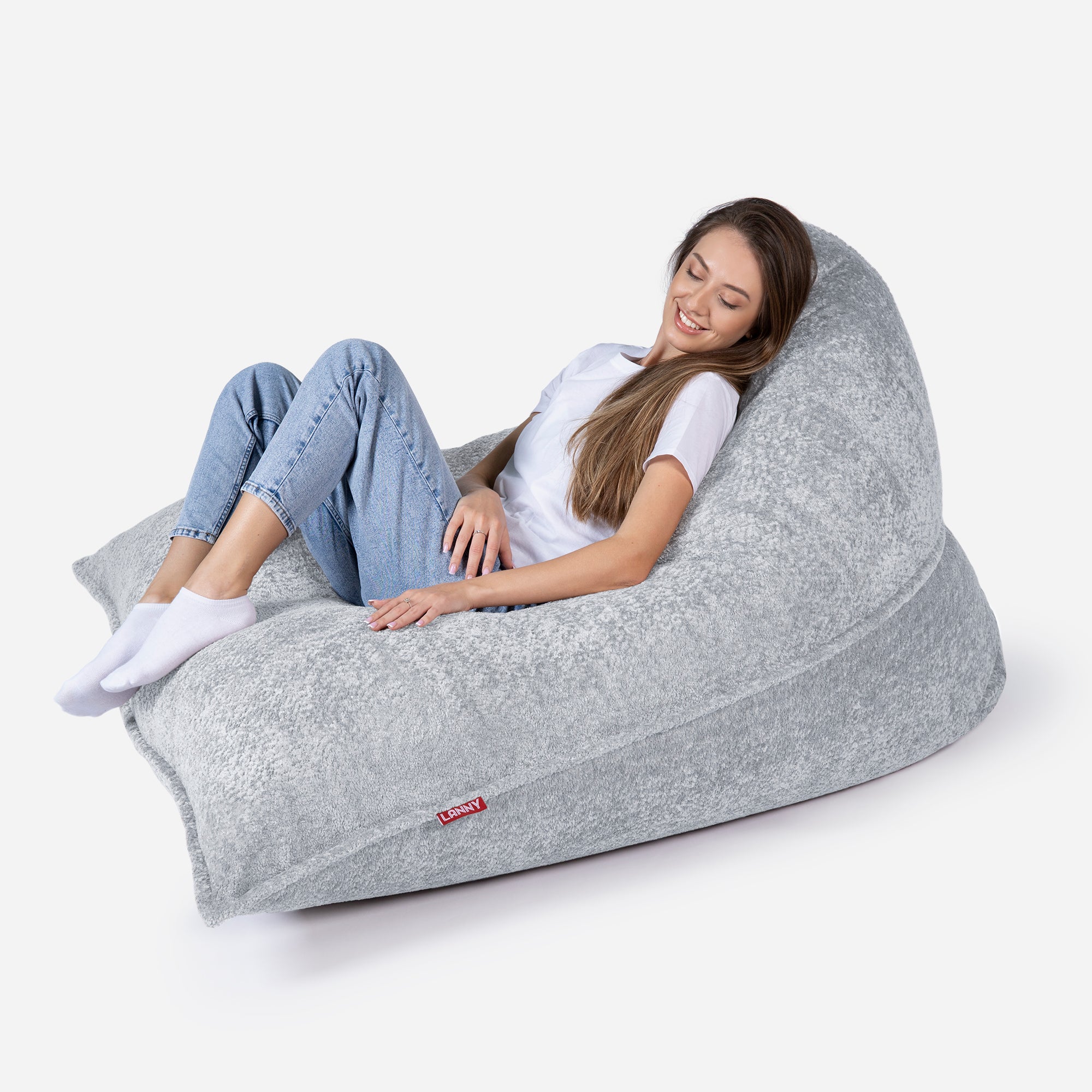Beanbag Sloppy design fluffy fabric Gray color  with girl seating on it 