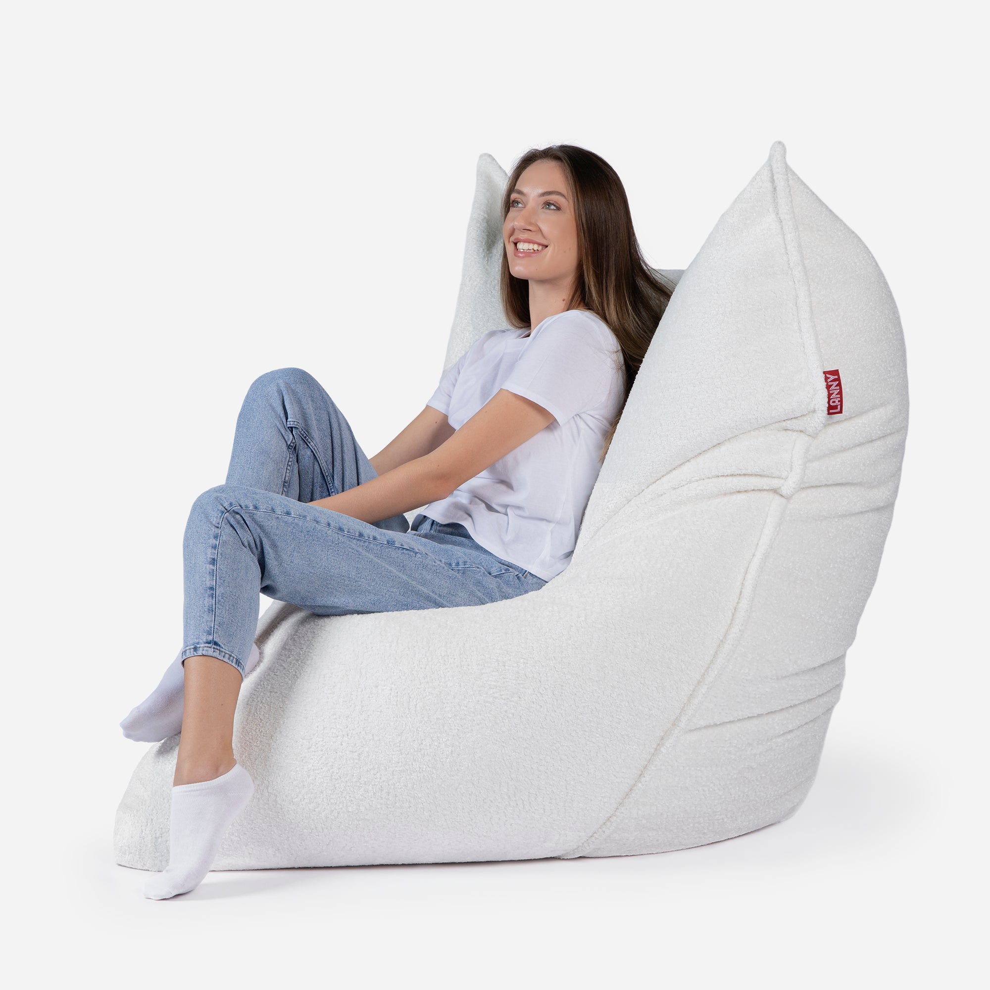 Beanbag Sloppy design fluffy fabric White color  with girl seating on it 