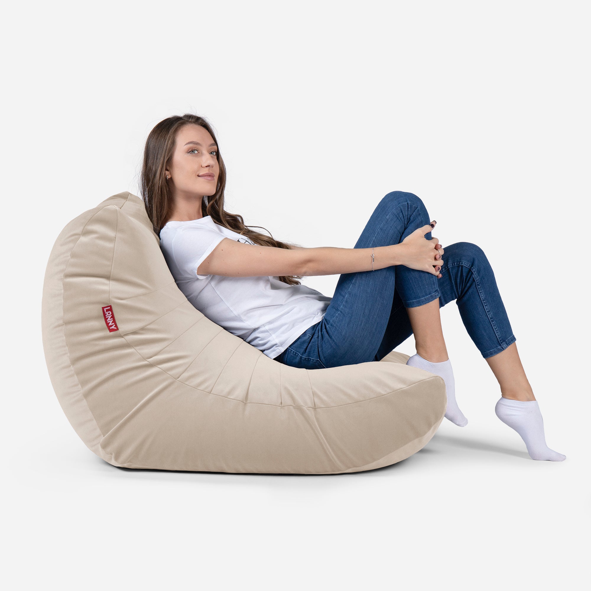Beanbag Curvy Design Beige color with girl seating on it 