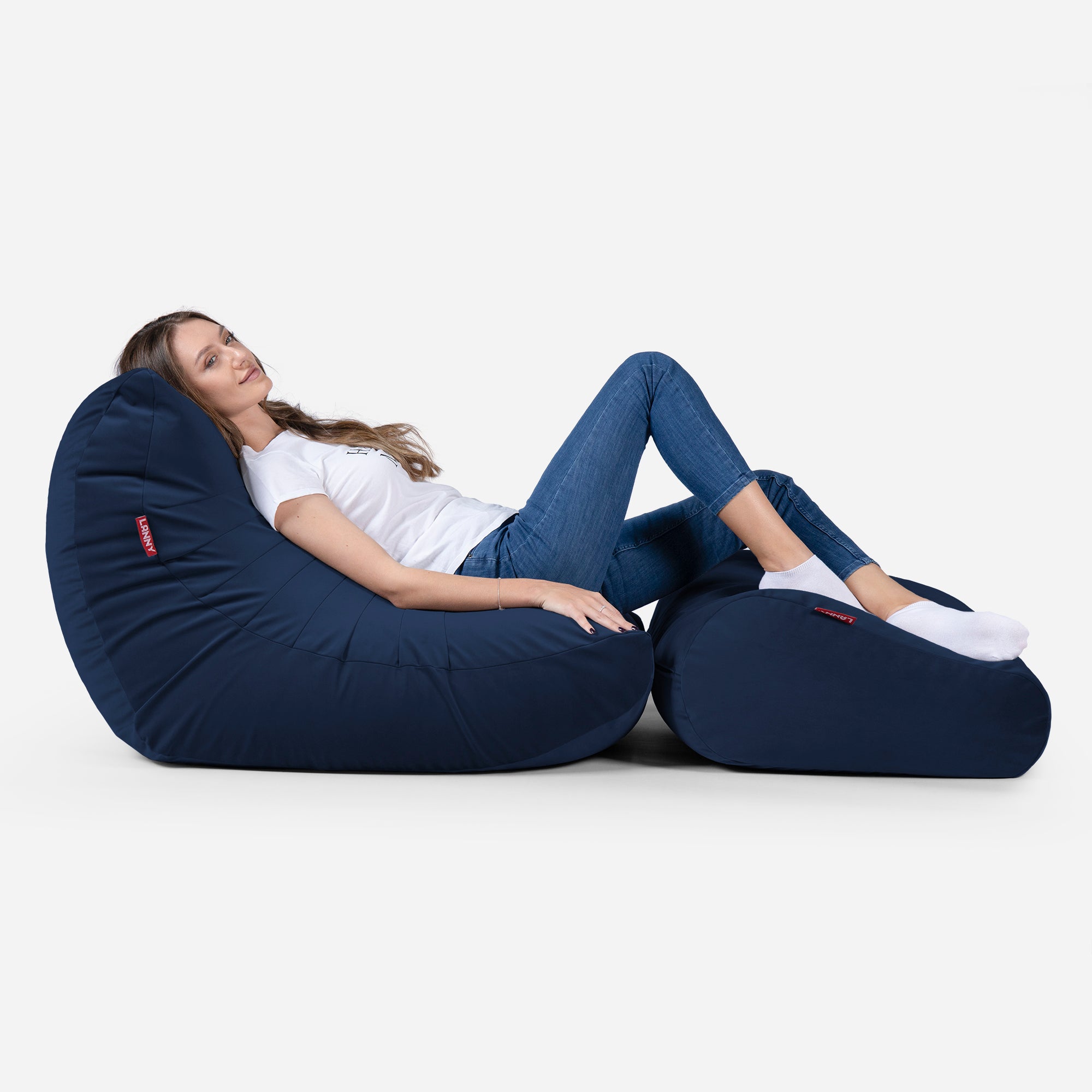 Beanbag Curvy Design Blue color with girl seating on it 