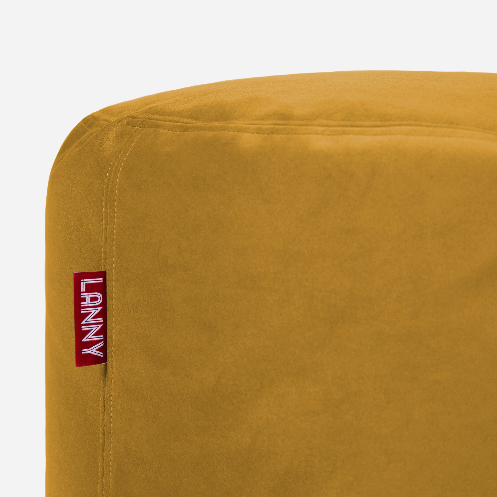 Lanny pouf made from velvet fabric in Mustard color